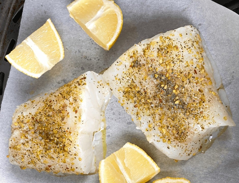 Mahi-mahi fillets in the air fryer with lemon wedges