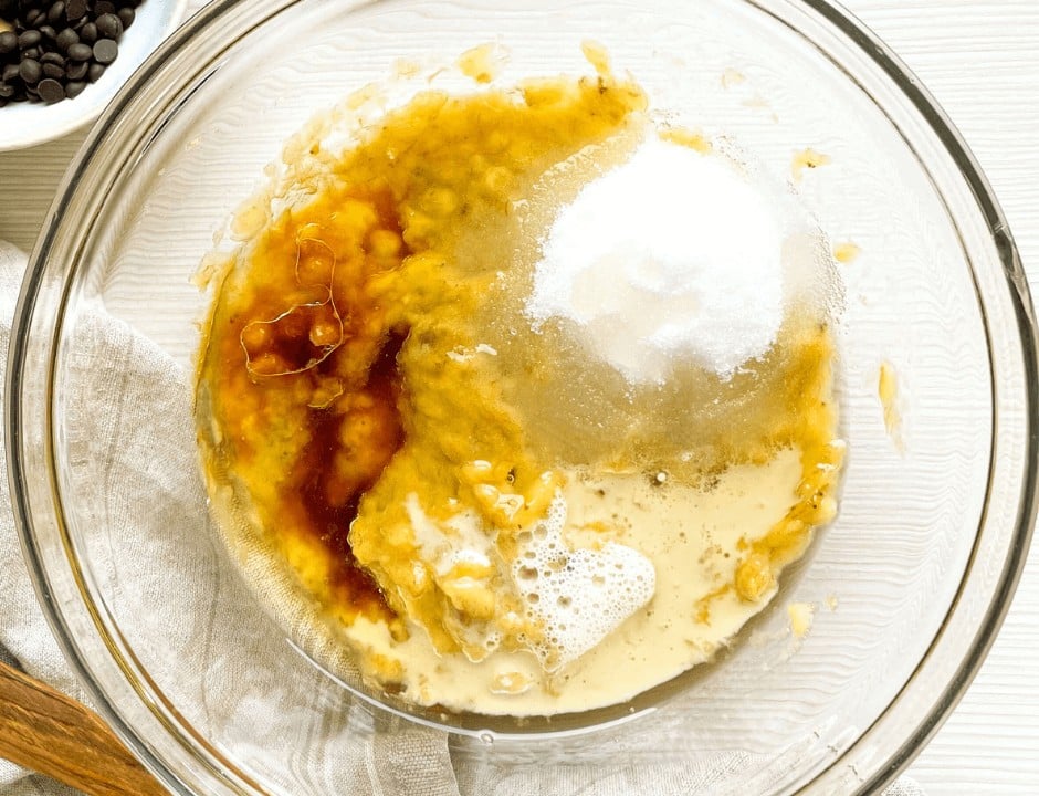 Mixing the wet and dry ingredients for the banana bread recipe