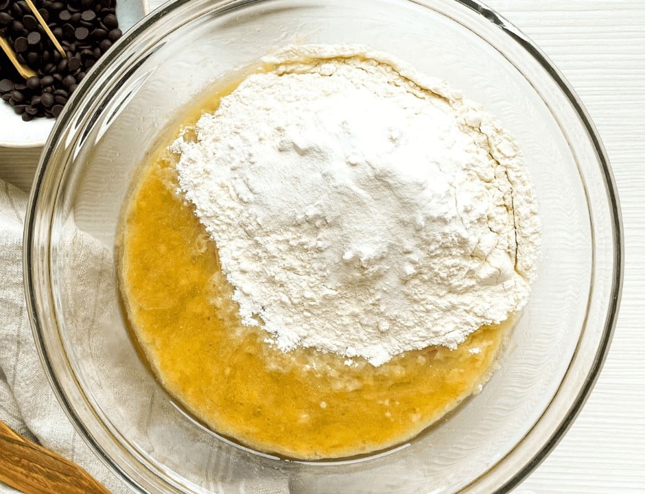 Placing the flour on the wet ingredients