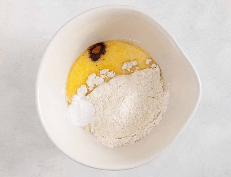 Combining the ingredients for the white batter in a white bowl