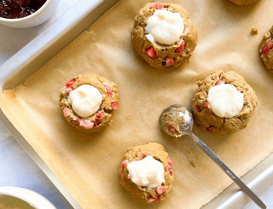 Cream cheese filled in the center of the cookie batter