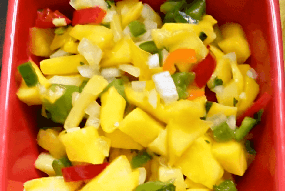 A closeup of Homemade Pineapple Mango Salsa