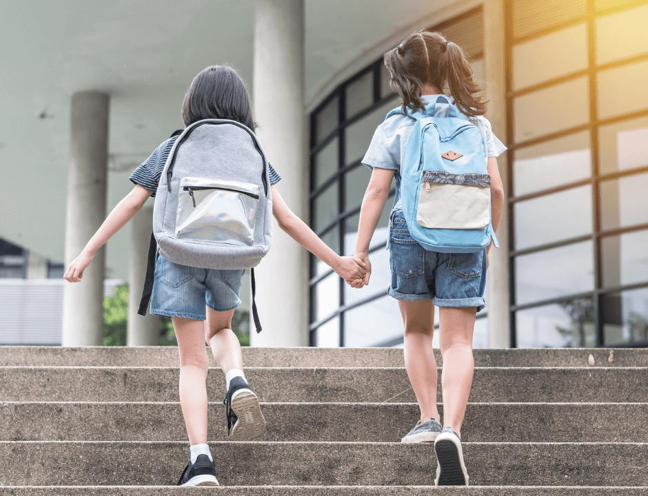 Two girls heading back to school