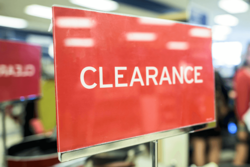 A red clearance sign