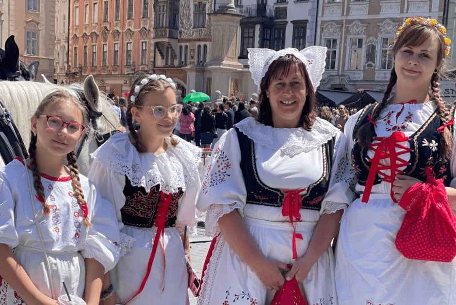 Women in traditional costumes in Prague