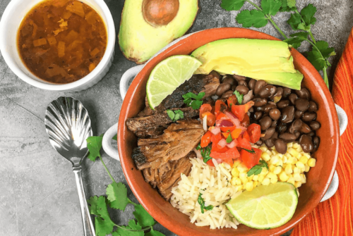 A closeup of a bowl of an Easy Pork Carnitas Burrito Bowl