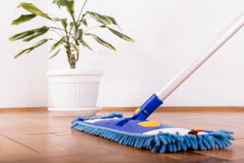 A mop on a hardwood floor - How to Easily Clean Your Hardwood Floors