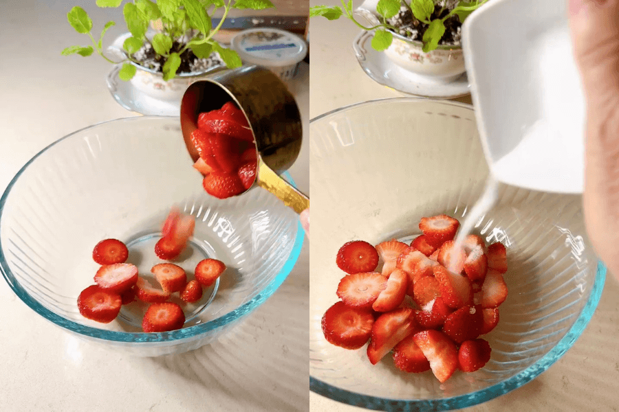 Combining sliced strawberries and white sugar