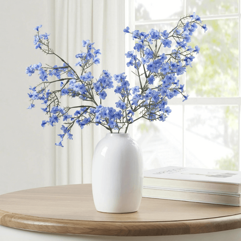Blue Faux Floral Springs in White Ceramic Vase