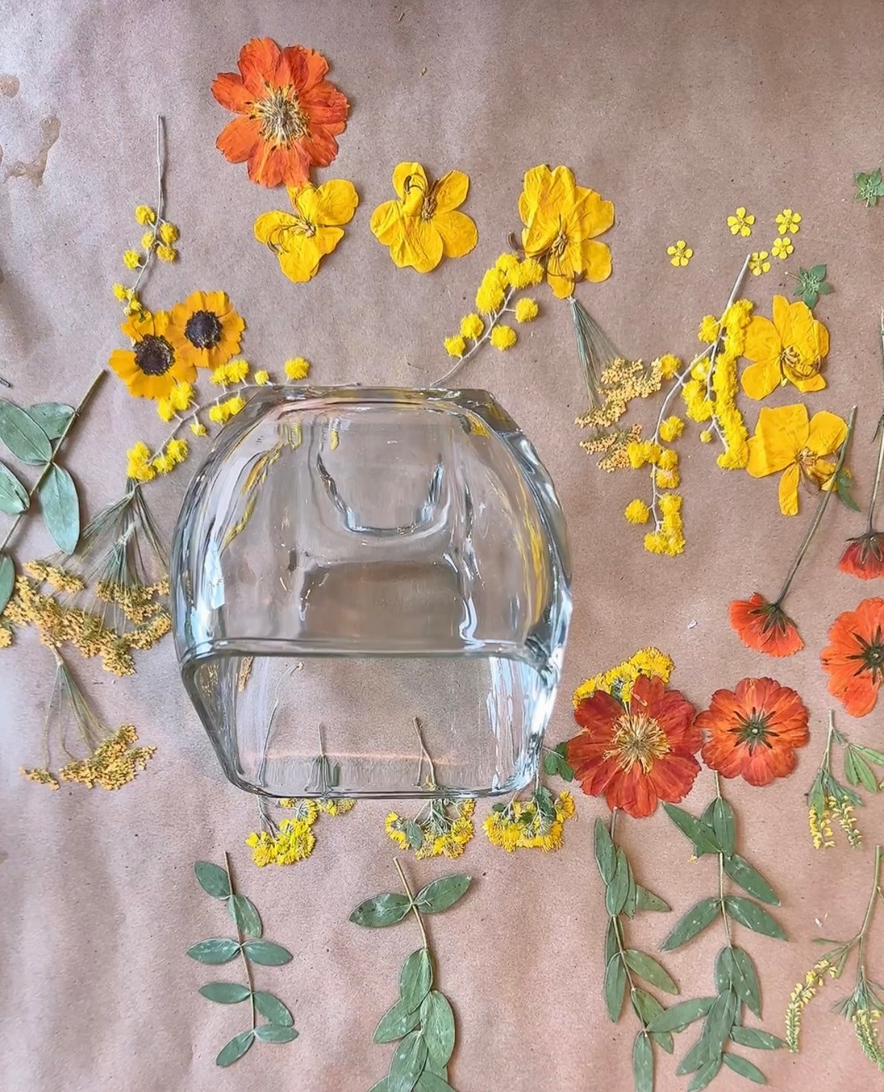 preserved flowers and votive to make a decoupaged candle holder