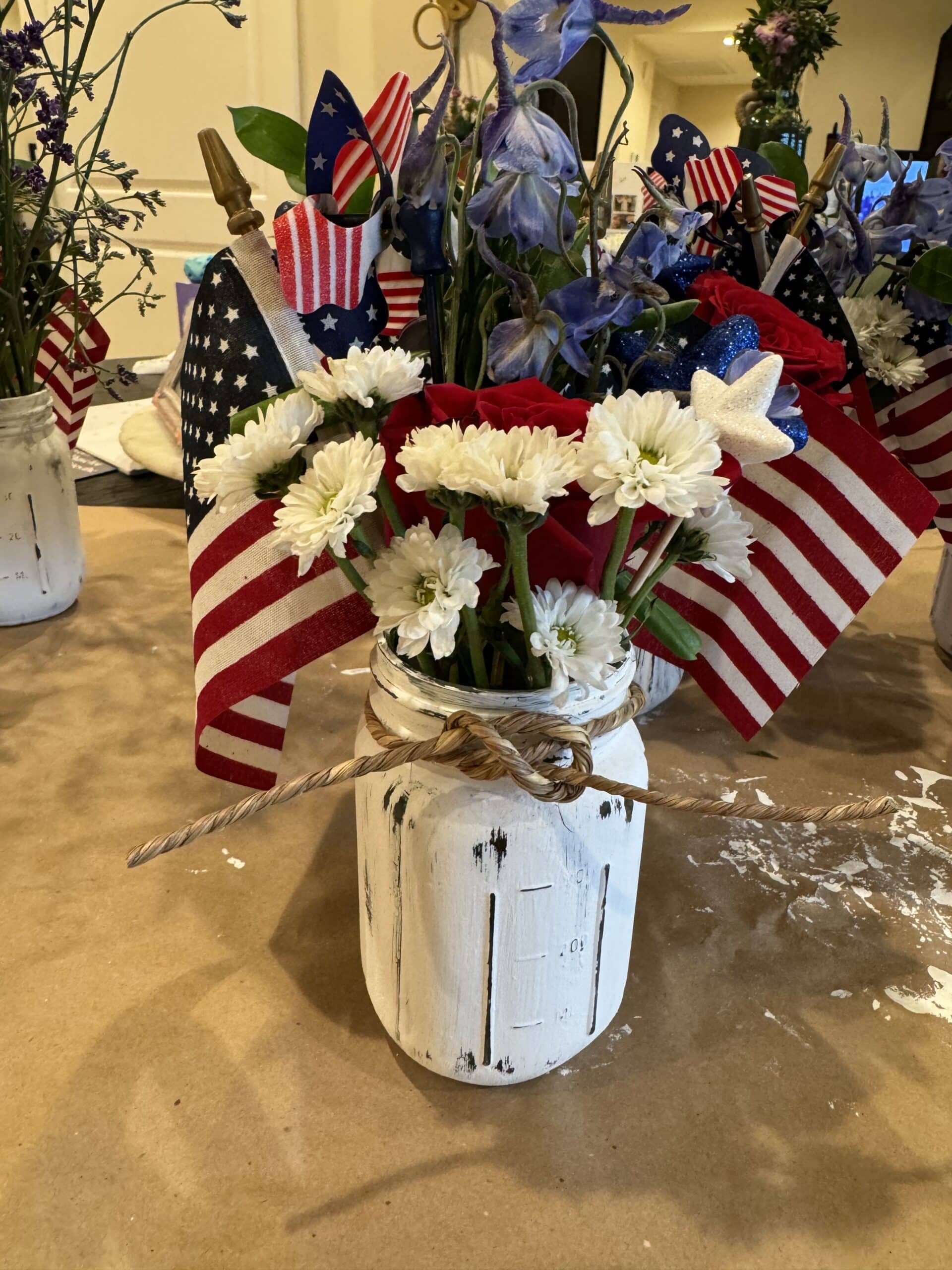 4th of July centerpiece craft made from canning jars