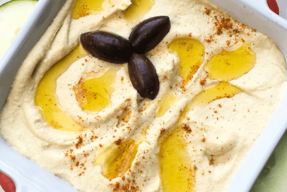 A closeup of Creamy Roasted Garlic Hummus