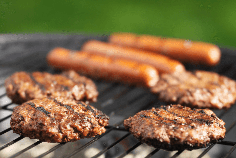 Burger and franks on a grill