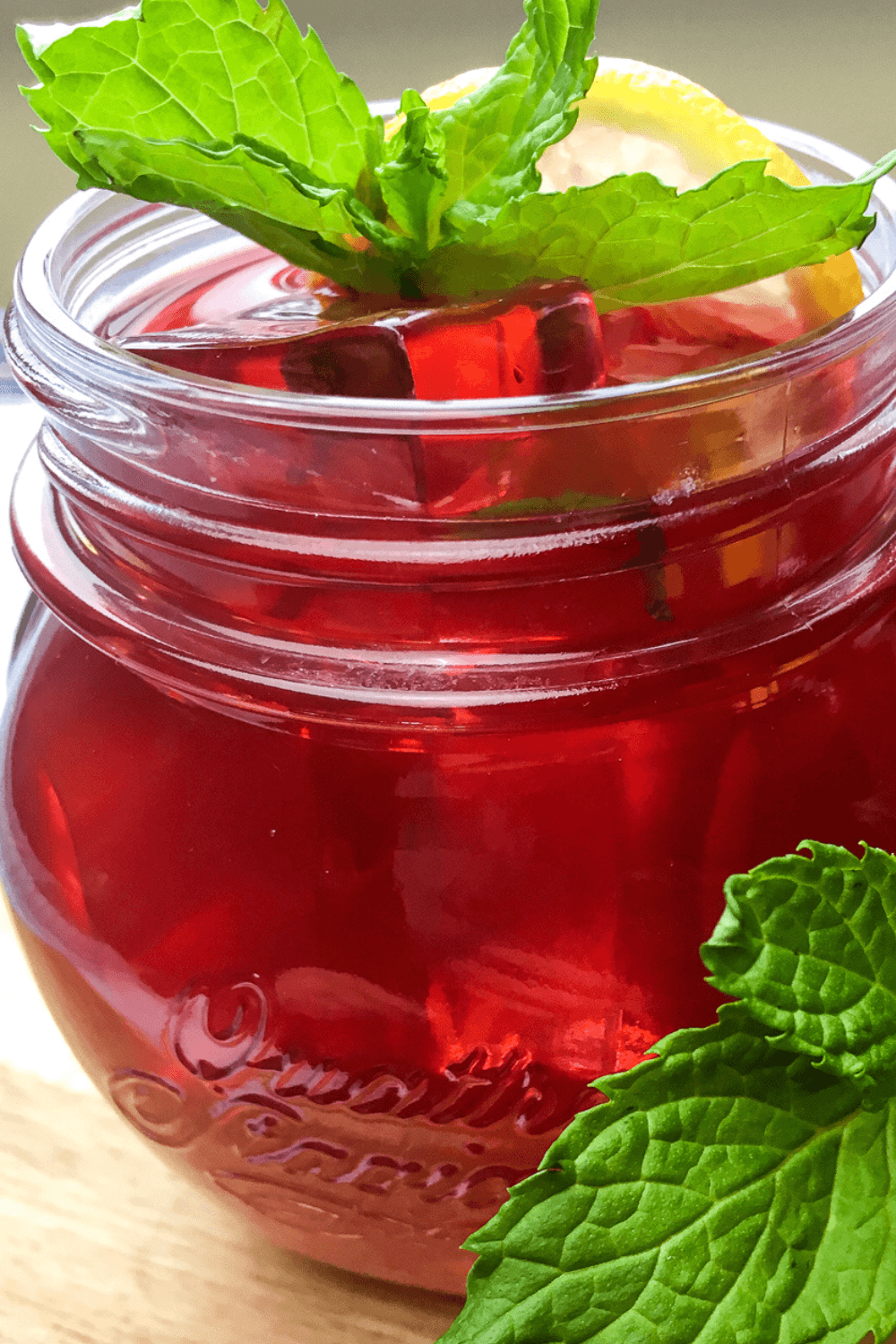 A glass of cold Copycat Passion Tea Lemonade