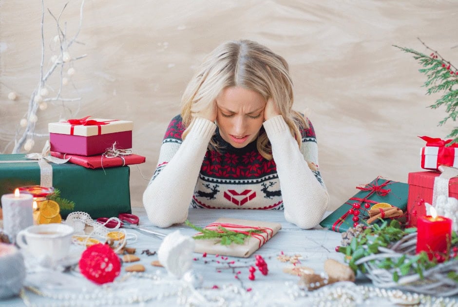 A woman stressed about the holidays