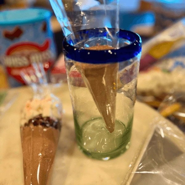 Adding the cocoa powder in the cello bag