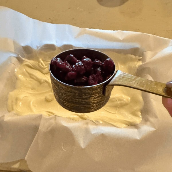 Dried cranberries in a measuring cup