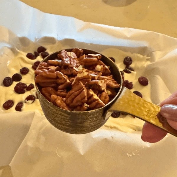 Chopped Pecans in a measuring cup