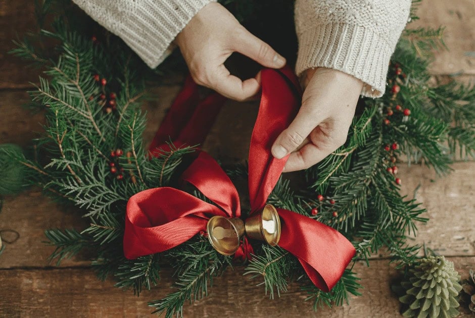 homemade Christmas wreath with a large red bow