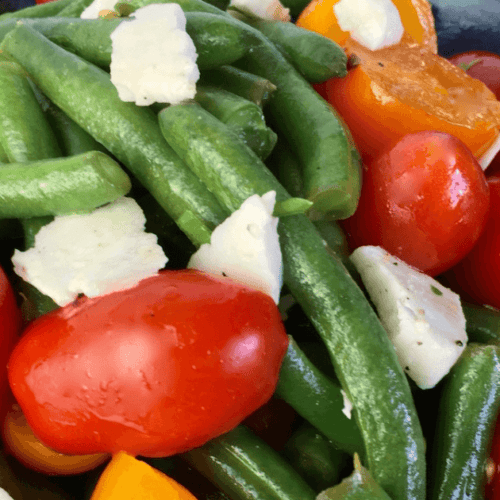 A closeup of Refreshing Garden Herb Salad with Feta Cheese