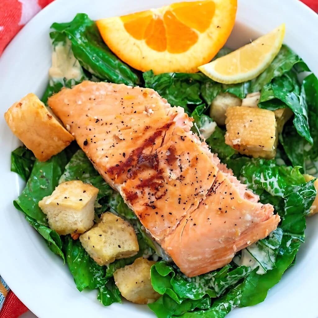 Caesar Salad With Grilled Citrus Salmon And Garlic Croutons