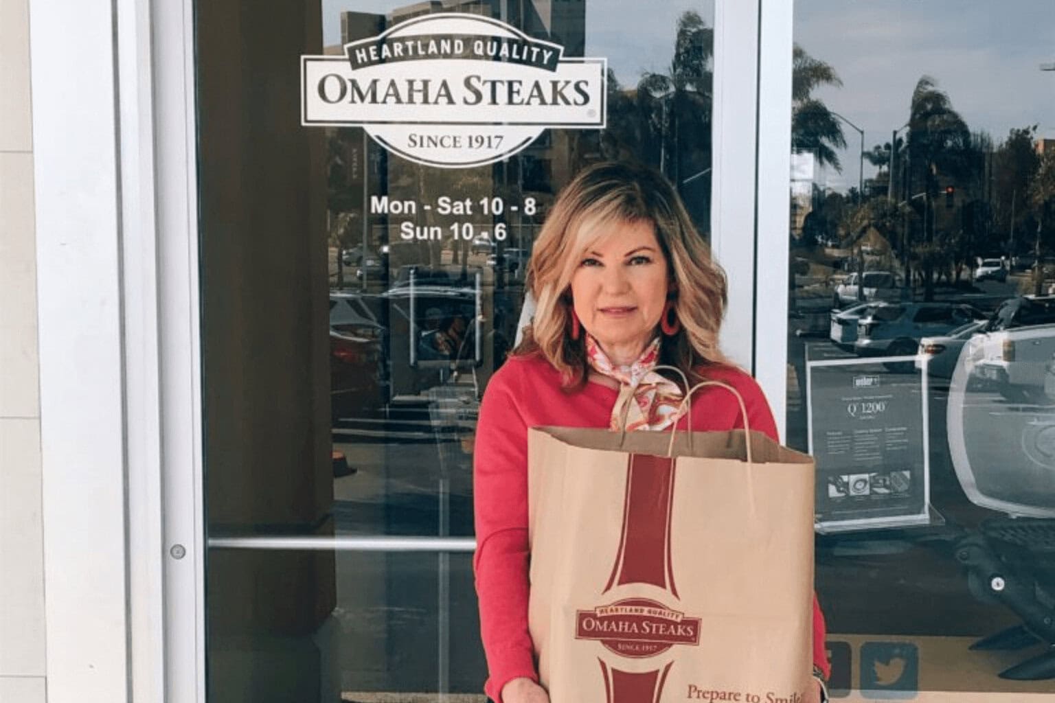 Lori in front of Omaha Steaks shop