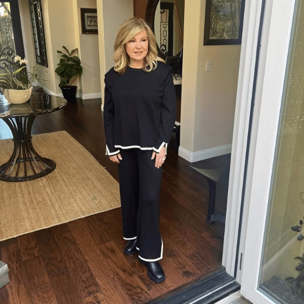 Lori wearing Amazon black suit