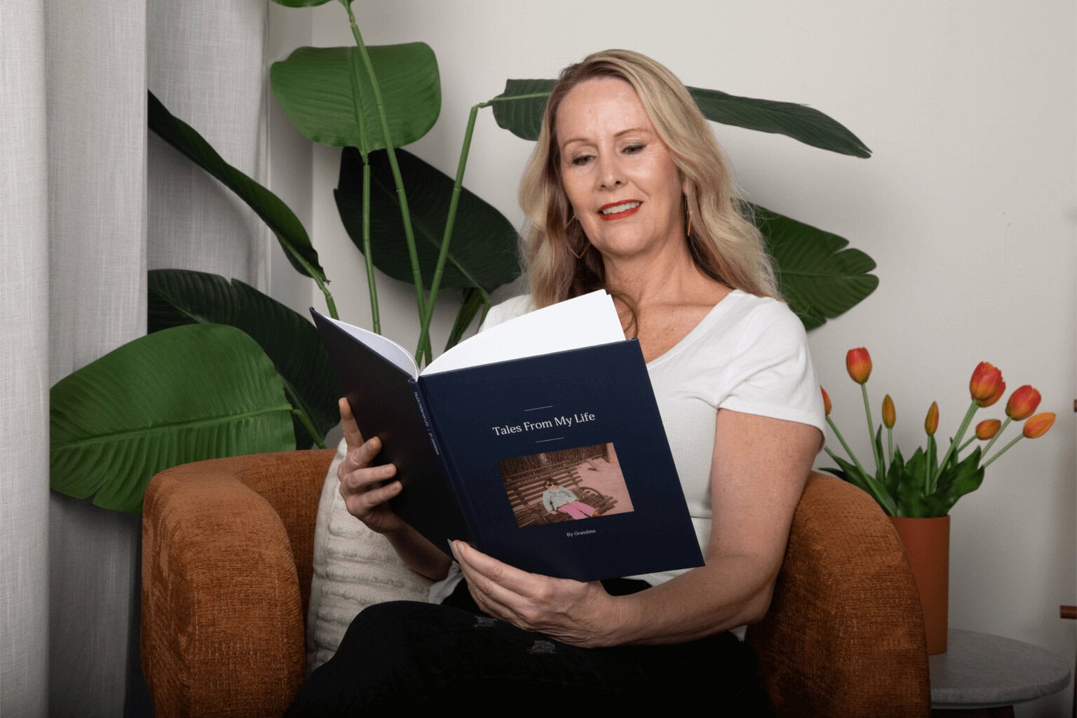 Woman holding a Remento book - Remento Review