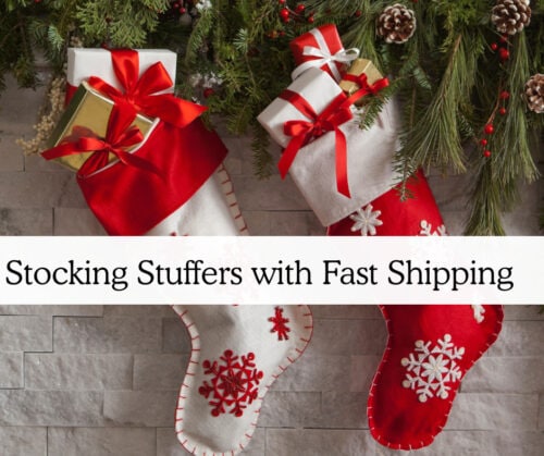 Two Christmas stockings filled with gifts